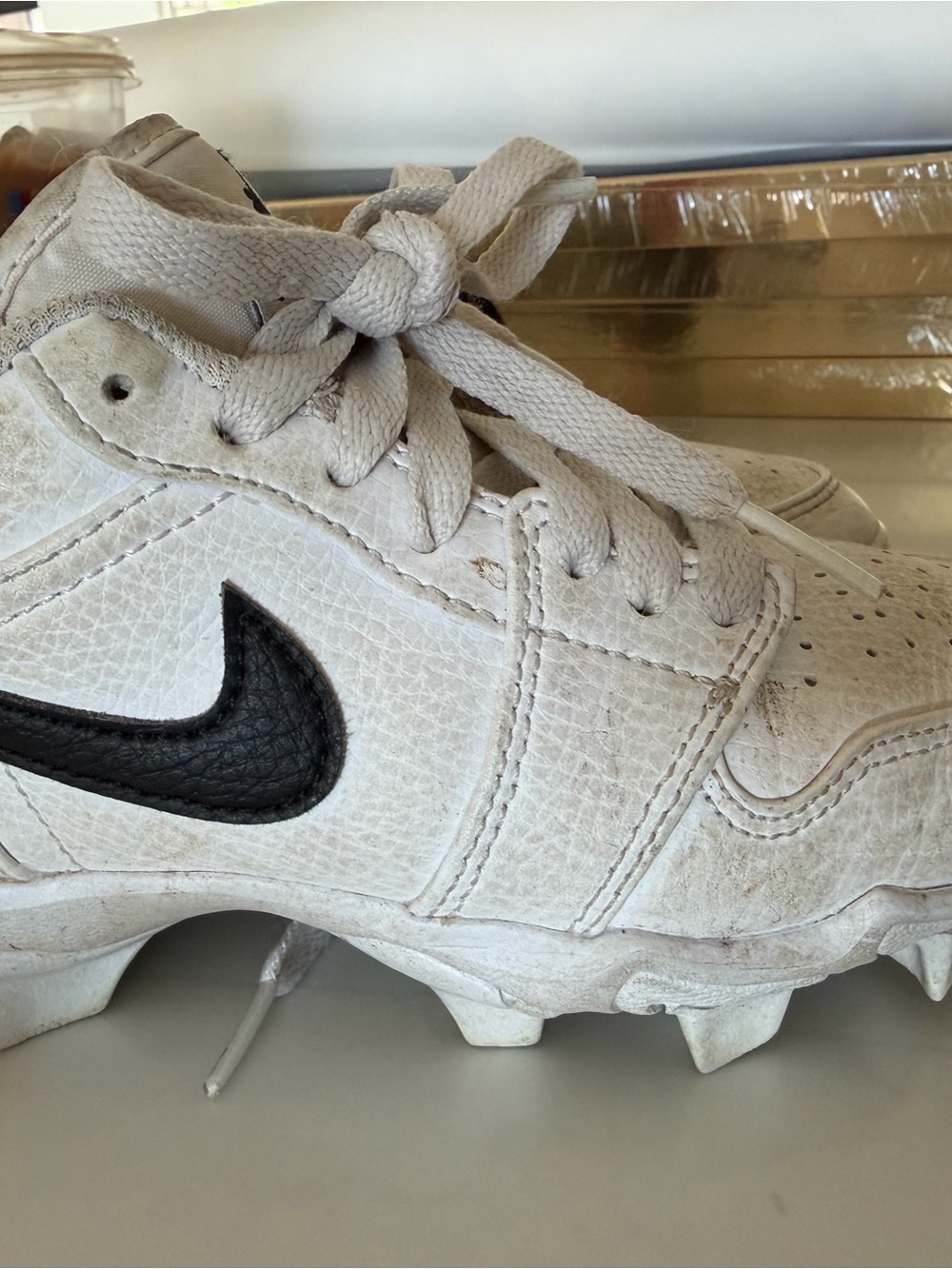 Nike White Cleats with Black Swoosh